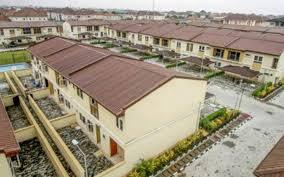 Lagos property buyer reviewing government fees and land documents